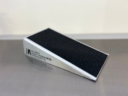 Slant board to improve ankle flexibility and help you squat with flat feet